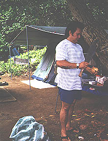 photo: husking coconuts