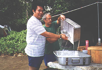 photo: finishing straining coconut milk